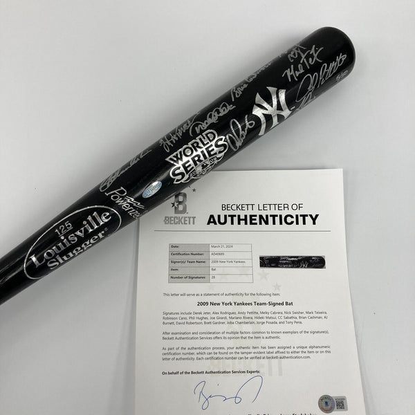 2009 New York Yankees World Series Champs Team Signed Bat #5/50 Beckett COA
