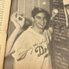 1955 Brooklyn Dodgers W.S. Champs Team Signed Yearbook Jackie Robinson JSA COA