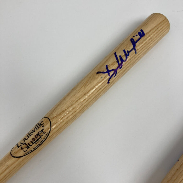 (8) Facsimile Signed Mini Baseball Bats Ken Griffey Jr & Chipper Jones