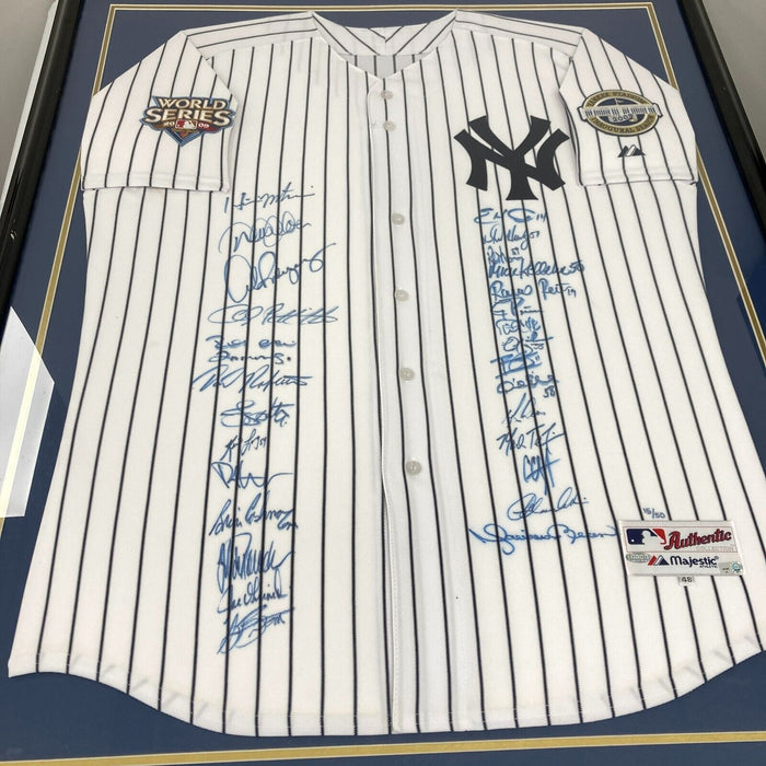 2009 New York Yankees World Series Champs Team Signed Jersey #15/50 Steiner