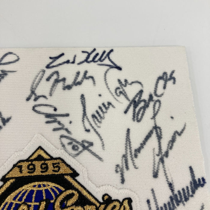 1995 Atlanta Braves Team Signed World Series Patch JSA COA Maddux Smoltz Chipper