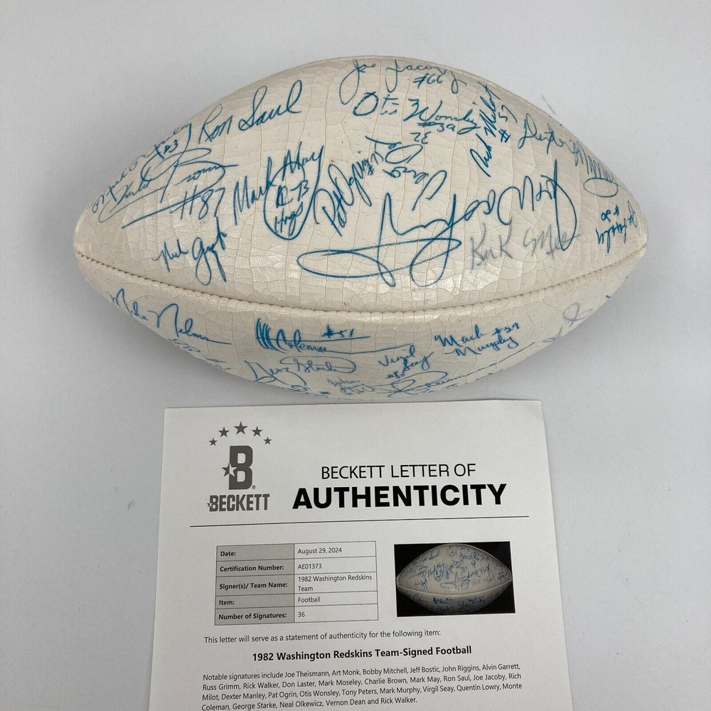 1982 Washington Redskins Super Bowl Champs Team Signed Football Beckett COA