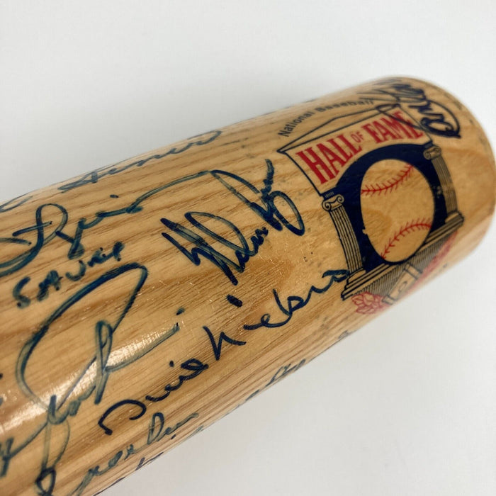 Beautiful HOF Multi Signed Bat 60 Sigs! Kirby Puckett Stan Musial Tony Gwynn PSA