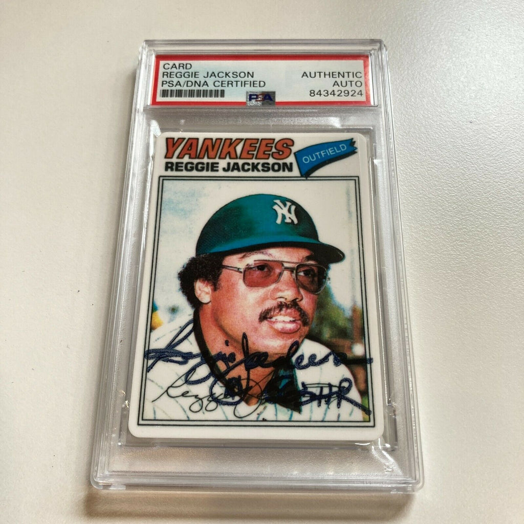 1977 Topps Reggie Jackson Signed Porcelain Baseball Card. #202/563 PSA DNA