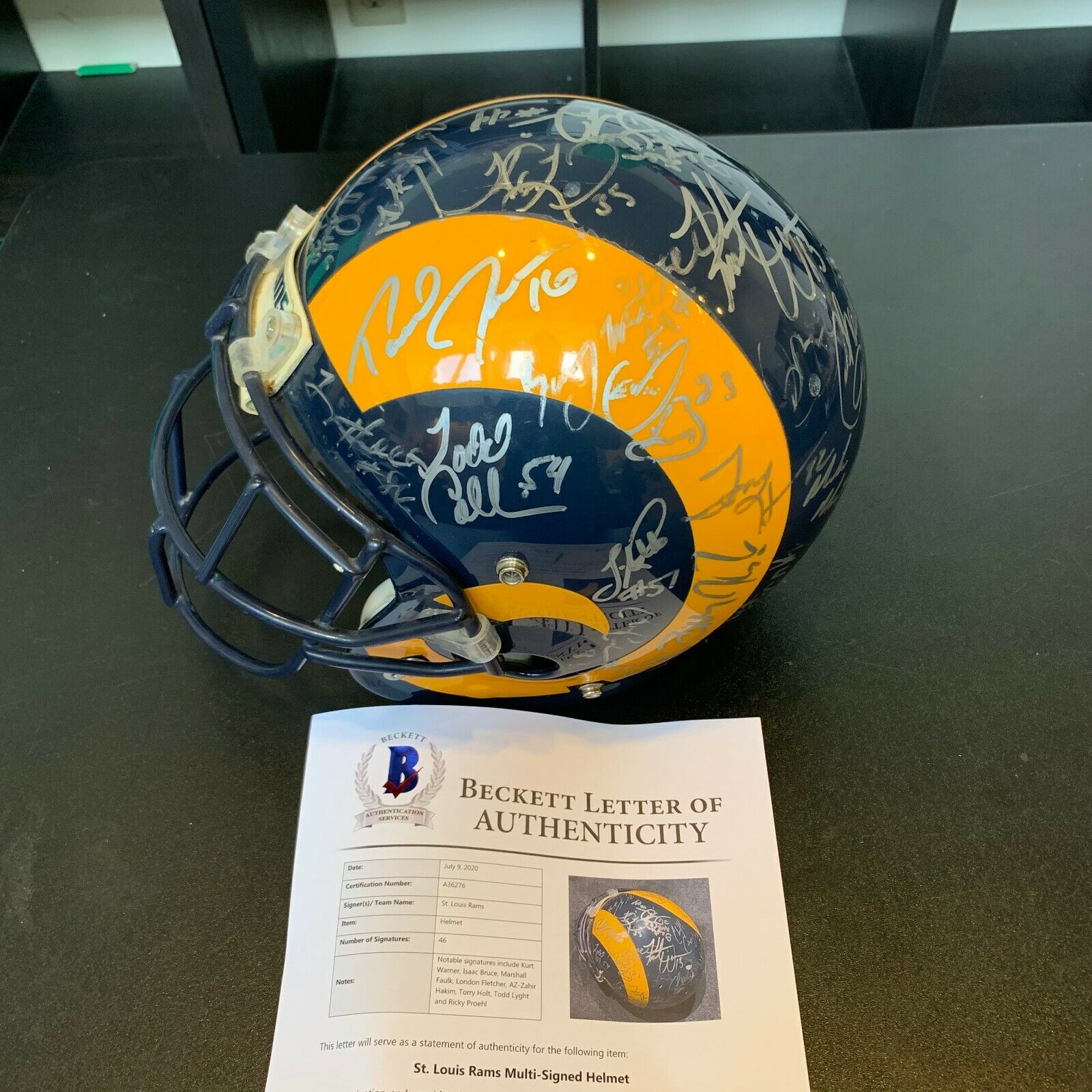 Lot Detail - Lot of (2) 1999-2000 St. Louis Rams Team Signed Full Size  Helmet With 21 Signatures & Kurt Warner Single Signed Super Bowl Helmet  (Tristar & Beckett)