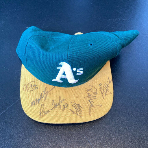 1980's Oakland A's Team Signed Game Model Baseball Hat With Rickey Henderson